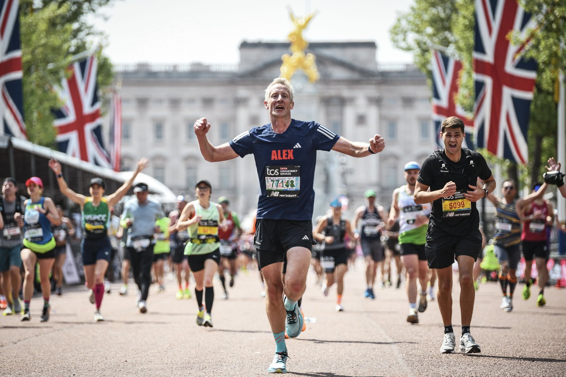 Mr Chipperfield celebrating at the TCS London Marathon finish, The Mall