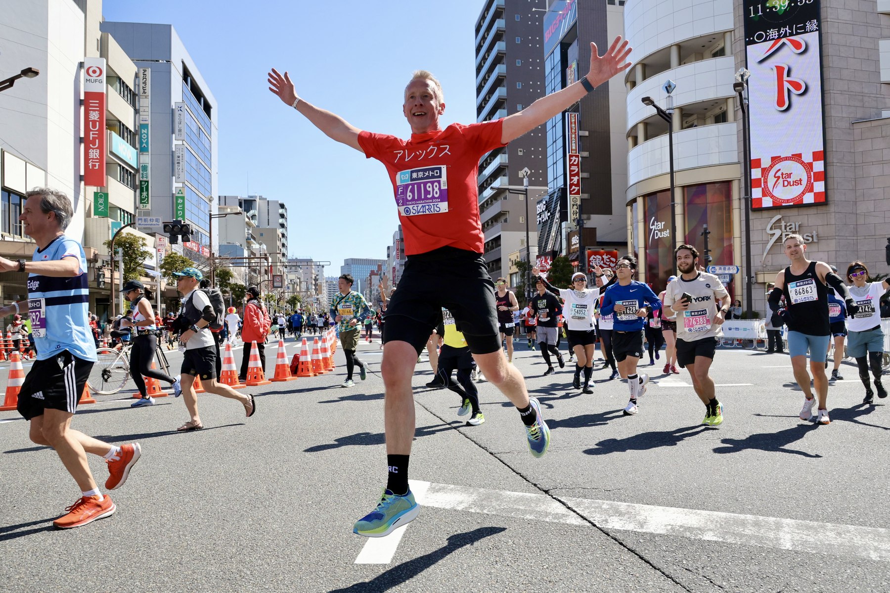 Mr Chipperfield celebrating mid-stride at the Tokyo Marathon 2024